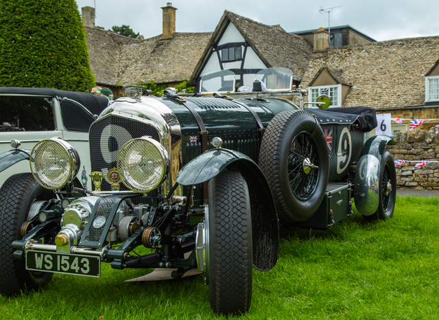 Not sure what the badges are but it's a gorgeous car